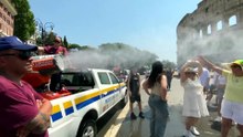Water cannons cool tourists at Rome's Colosseum amid heatwave