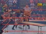 the Rock vs. the Dudley Boys (table match)