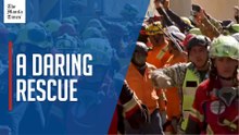 Rescue teams free survivor stuck under rubble of Venezuelan mall