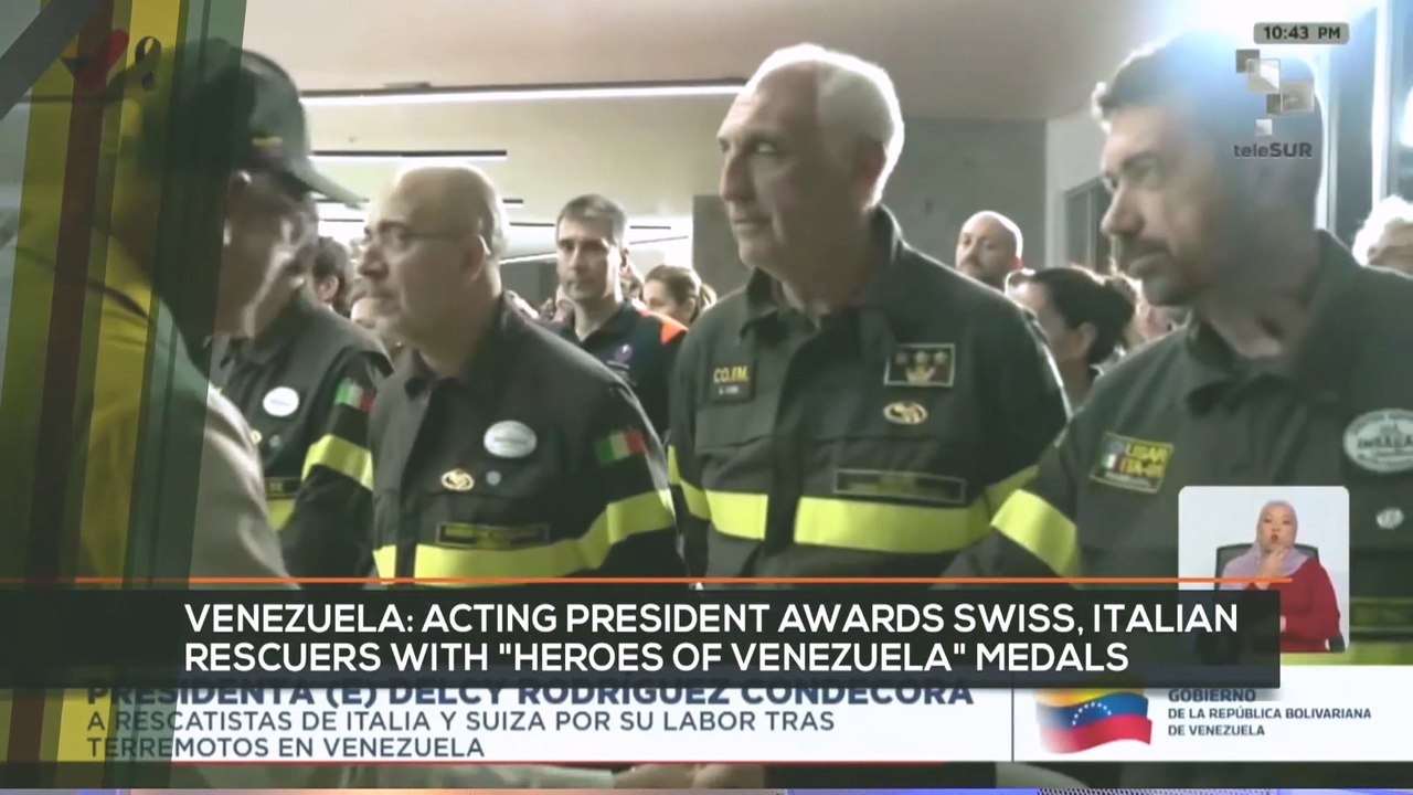 FTS 12:30 02-07: Pres. Rodriguez awards Swiss and Italian rescuers for their response