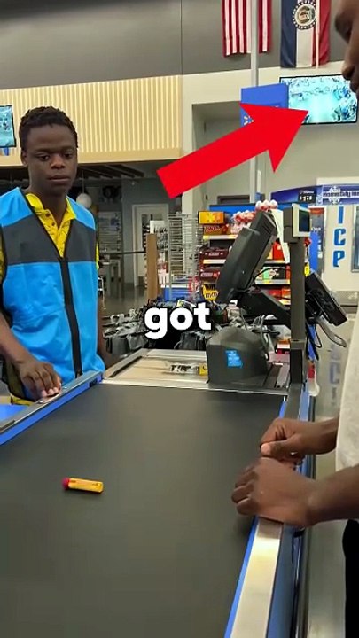 The cashier loses patience and retaliates for the tasteless prank.