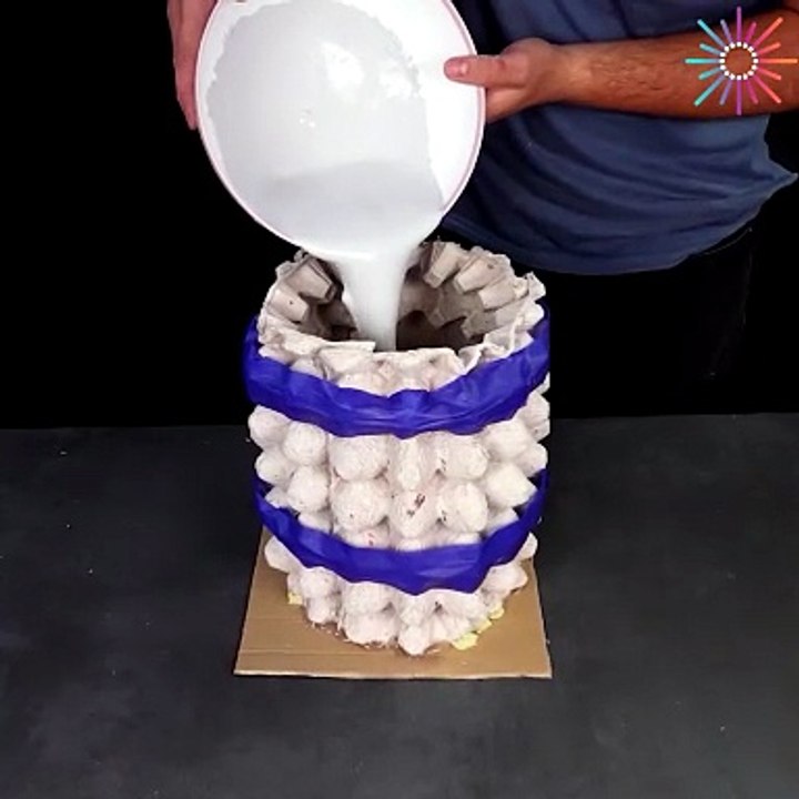 Making a flower pot out of egg tray is a genius idea!