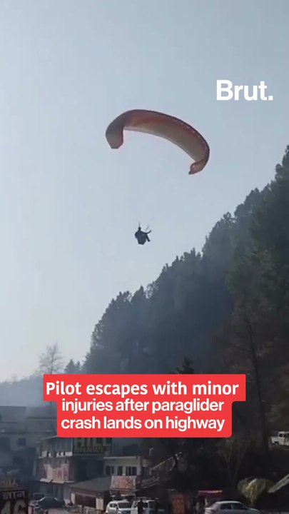 Pilot escapes with minor injuries after paraglider crash lands on highway