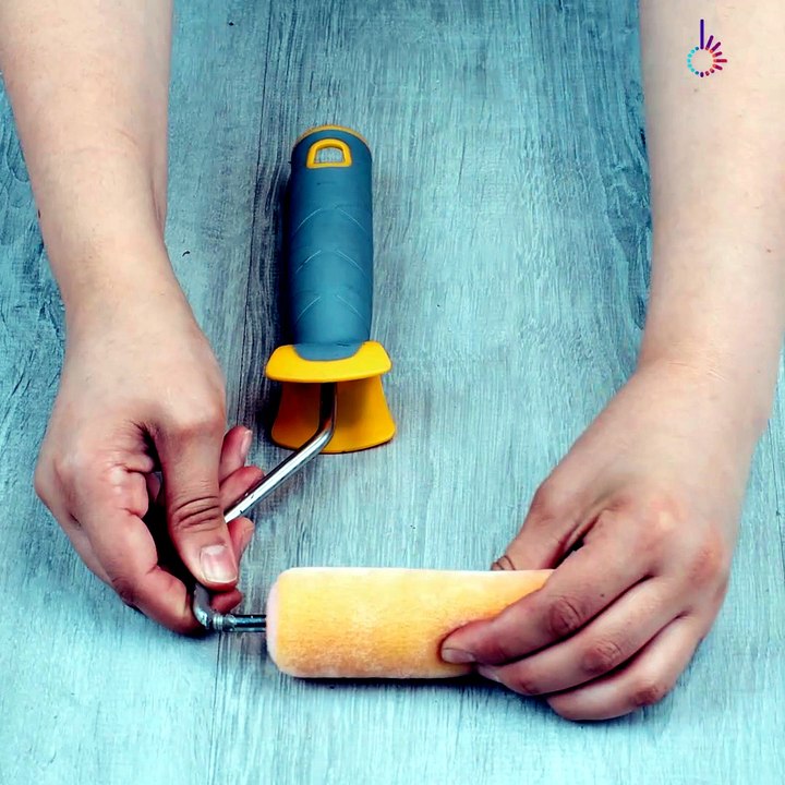 Make a thread spool holder into a painting roller