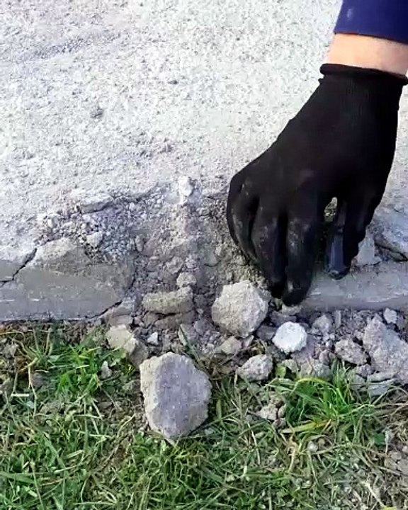 Fixing a broken spot on the sidewalk!