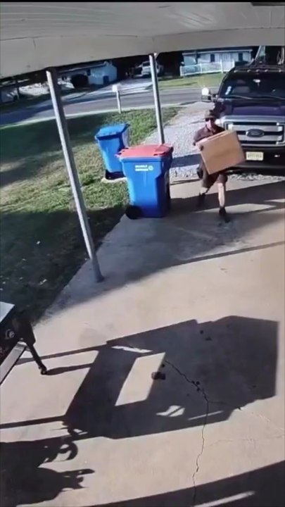UPS Driver Defends Himself From Dog Attack!