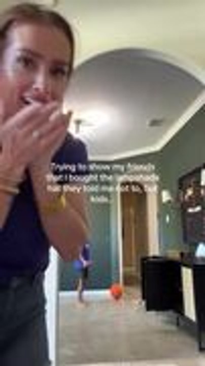 Boy Accidentally Knocks Something Over While Mom Films Her Lampshade Hat