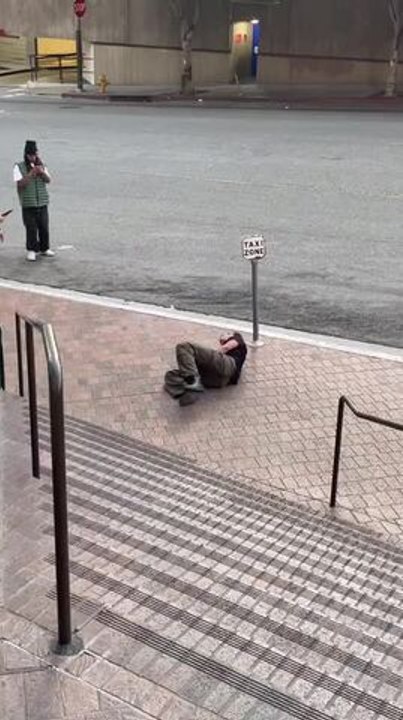 Skateboarder Falls Off Handrail During Stunt Attempt