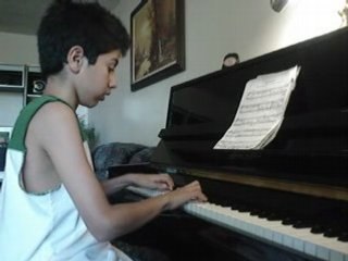 Lemar N playing Bourrée from JS Bach Piano
