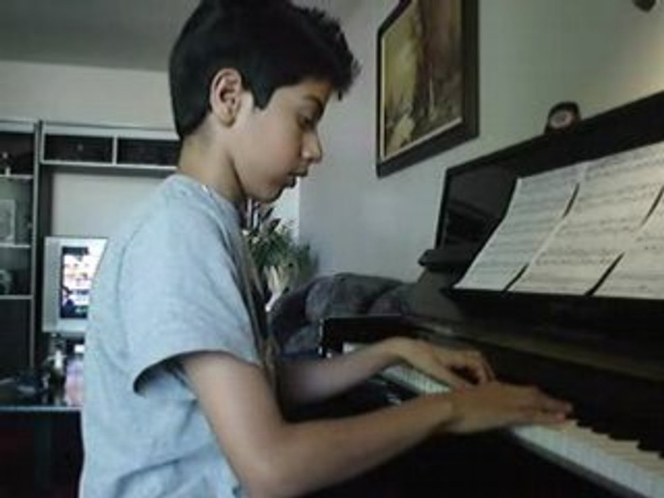 Lemar N playing Waltz in A minor from Chopin Piano