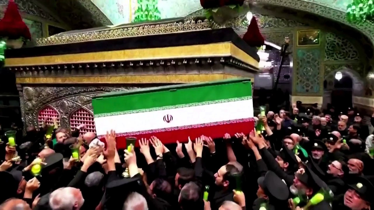 Mourners carry coffin of slain Iranian supreme leader to shrine of Imam Reza for burial