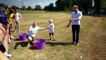 Prince Harry joins a water fight