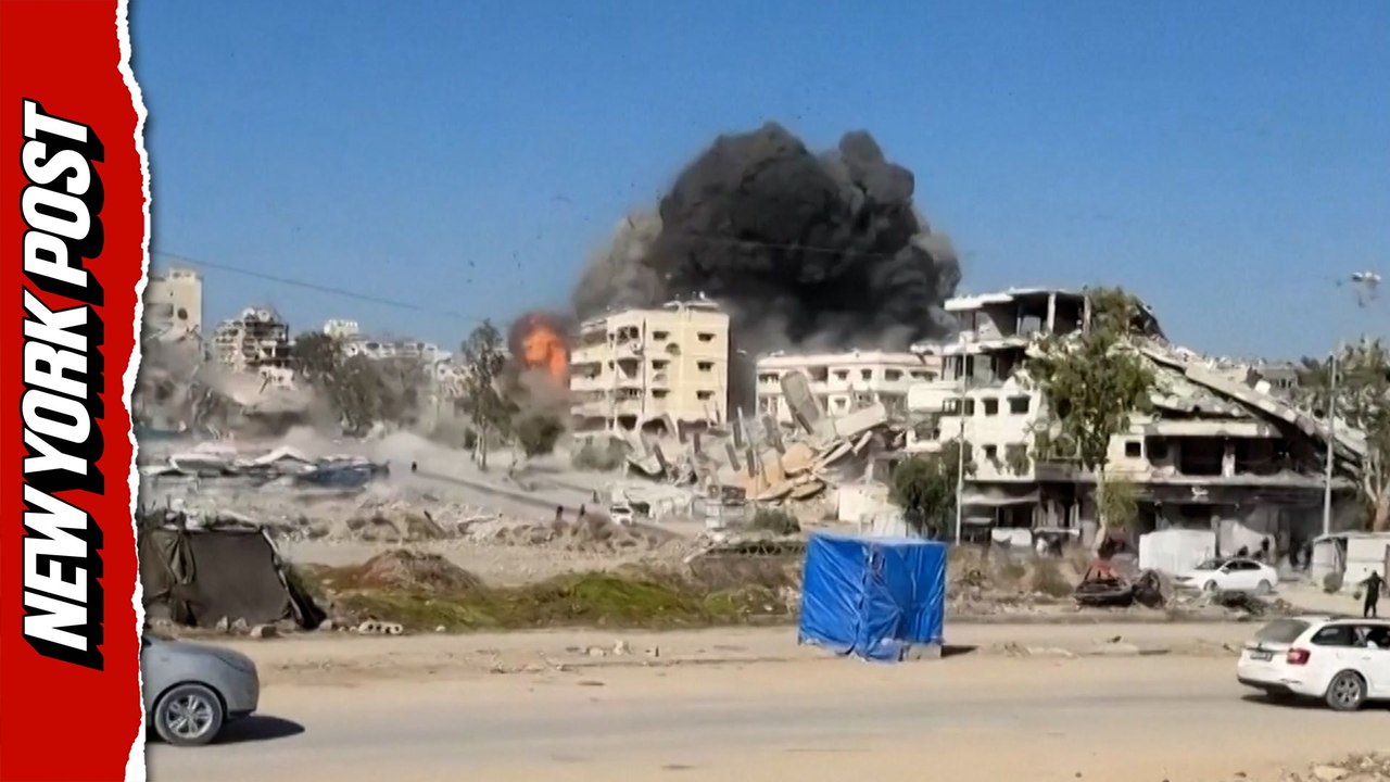 Smoke rises as Israeli strike hits Gaza factory