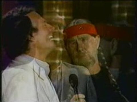 Johnny Carson as Willie Nelson singing with Julio Iglesias