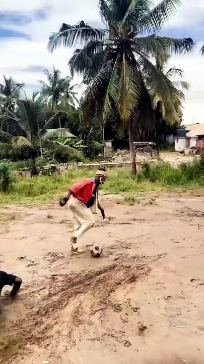 While playing football, the friends got very slippery due to the rain and fell.
