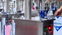 Cost-benefit comparison of fully automatic and semi-automatic can sealing machines