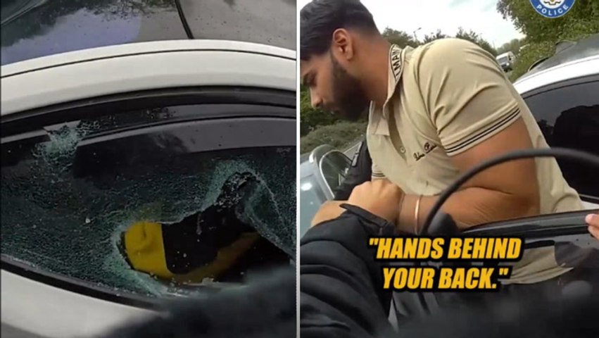 Dramatic moment armed police smash BMW windows and pull out gang members from car loaded with weapons