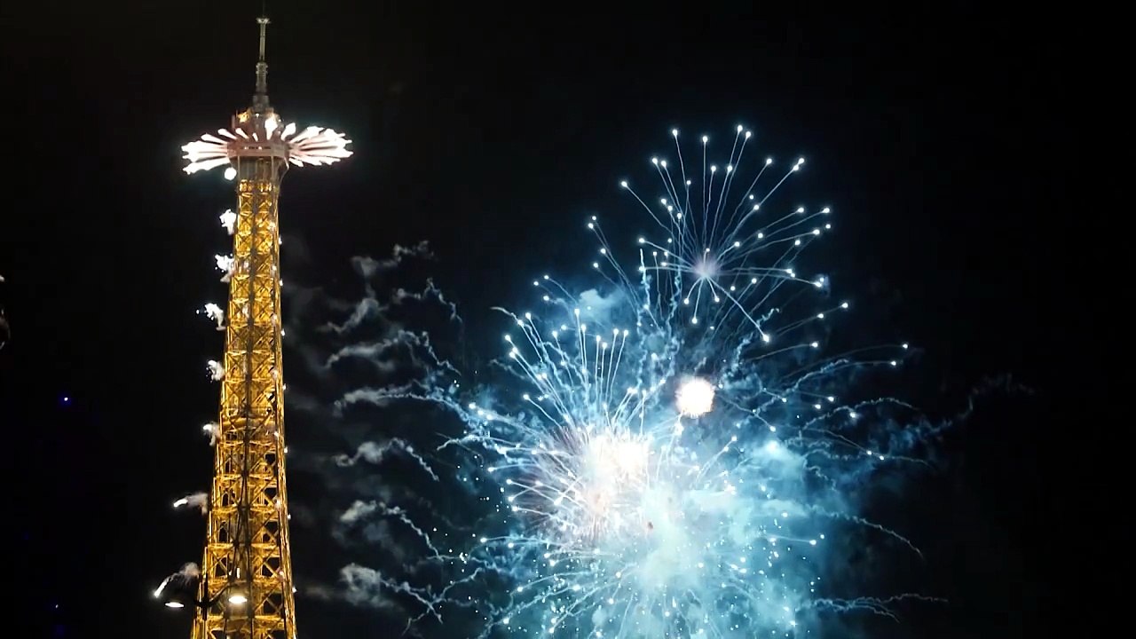 Drones and fireworks light up Eiffel Tower for Bastille Day