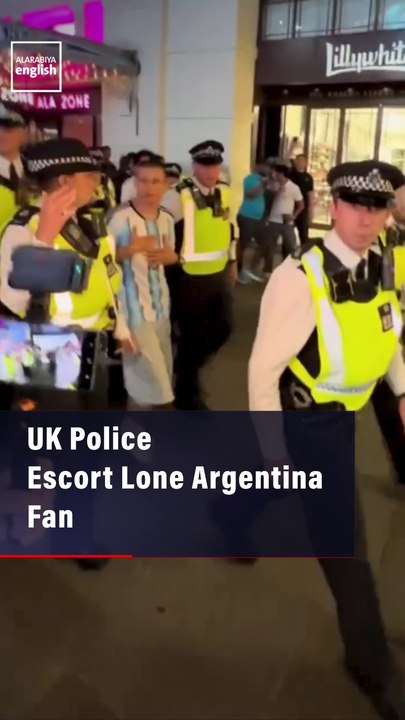UK Police Escort Lone Argentina Fan