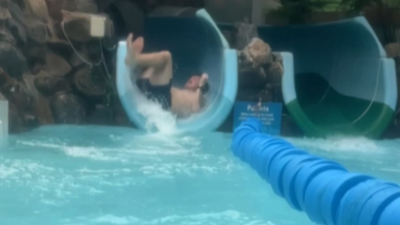Man Slides Down Waterslide And Wipes Out At The End
