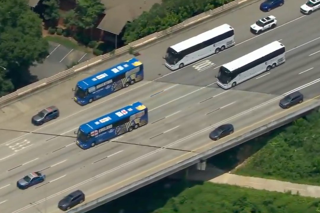 England's team bus overtakes Argentina's on the way to World Cup semifinal