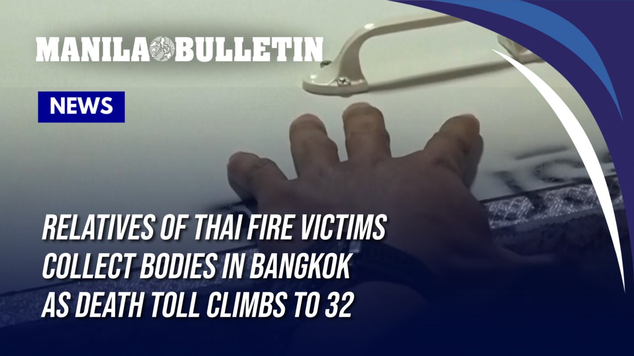 Relatives of Thai fire victims collect bodies in Bangkok as death toll climbs to 32