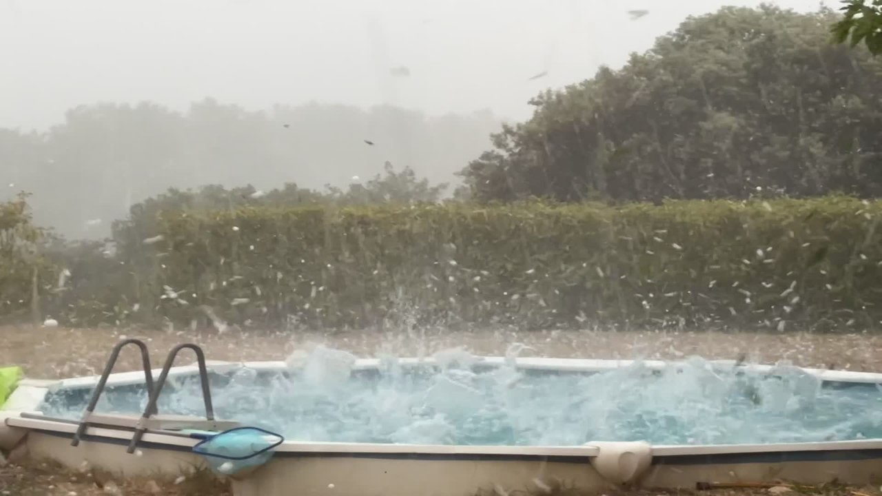 Hailstorm Slams Into Swimming Pool