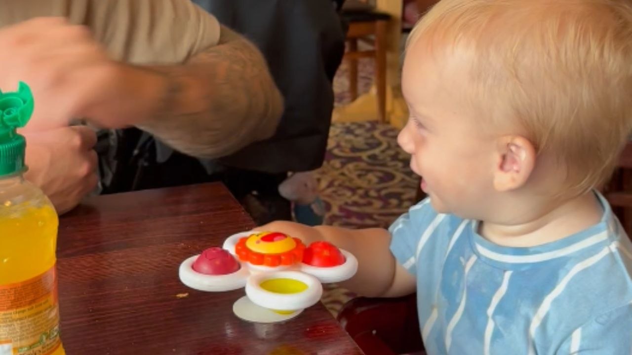 Boy's Joyful Laughter Sparks Heartwarming Father-Son Moment