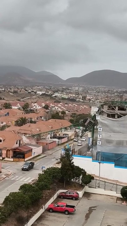 Massive crane CRUSHES homes in Chile