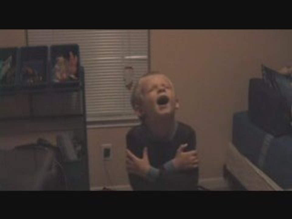 Boy singing britney spears scared to death by his mom