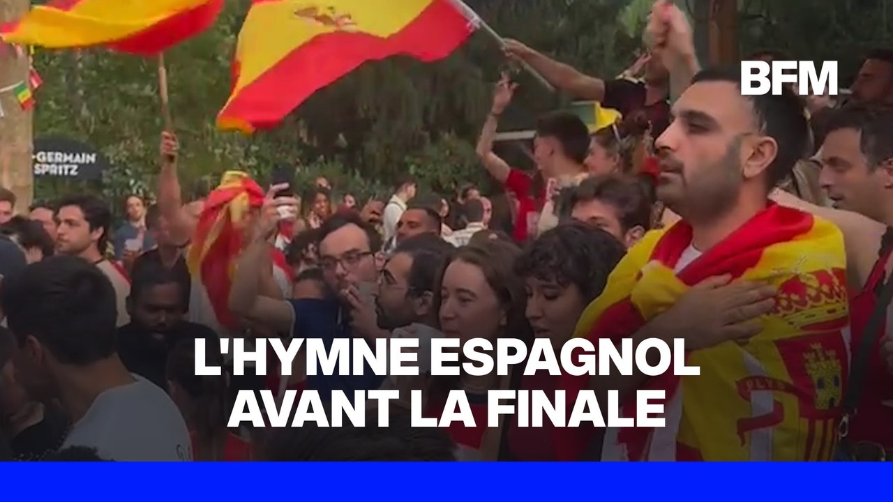 Les supporters espagnols, réunis au bois de Vincennes à Paris, chantent l'hymne avant la finale