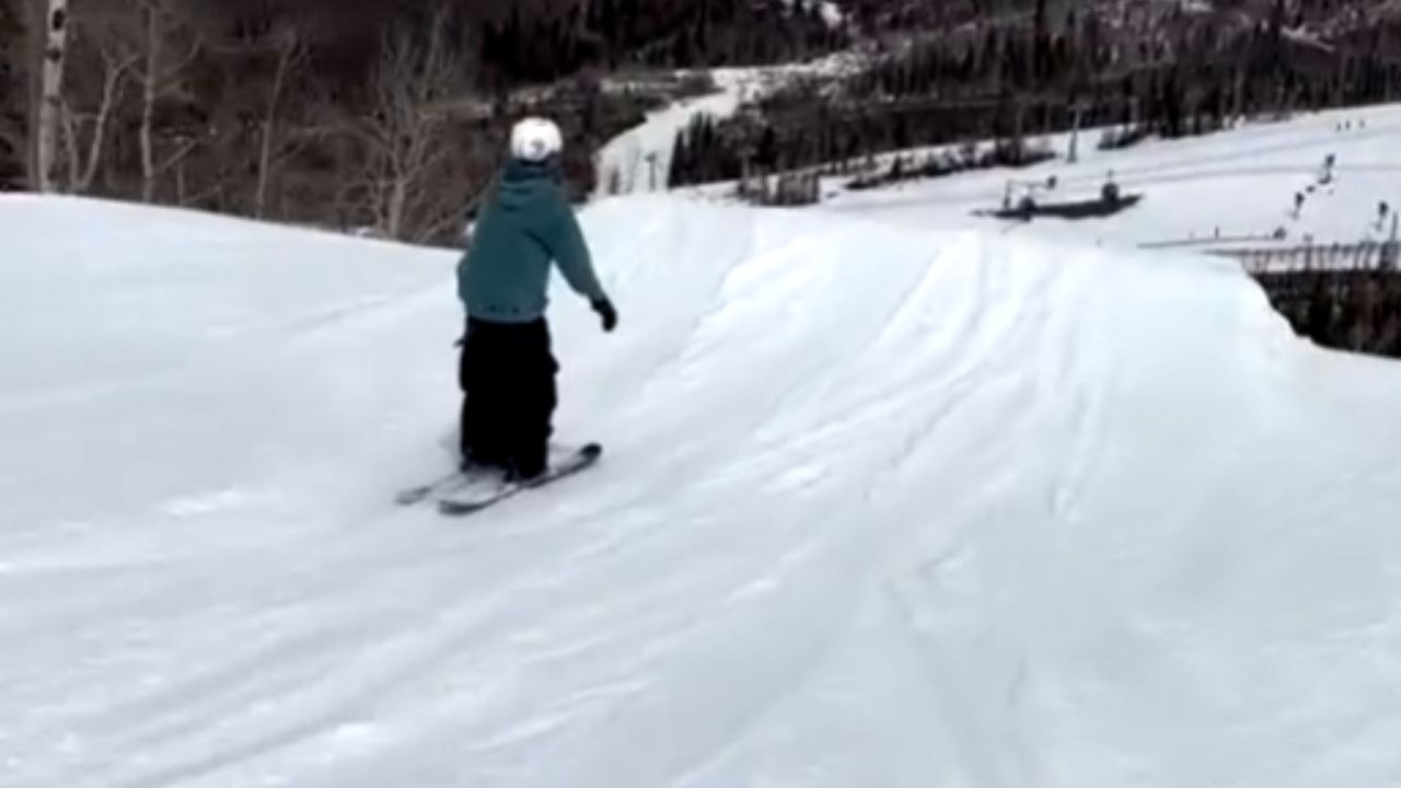 Skier Attempts Front Flip But Loses Skis Mid Ai...