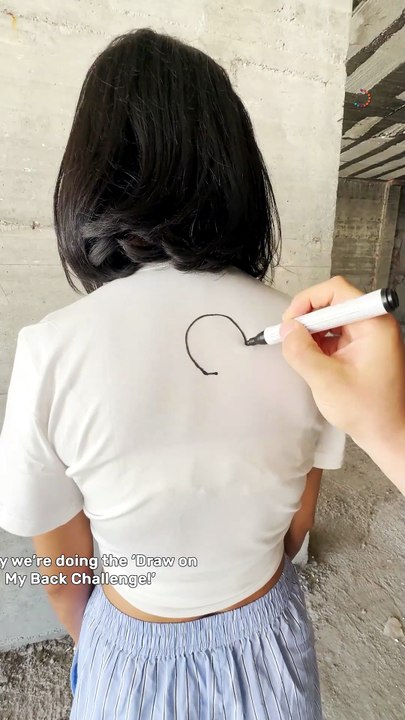 Can you guess what I’m drawing on your back? 😆✏️