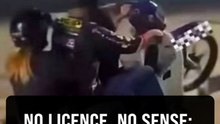 Wheelie with wife and child on board - rider arrested