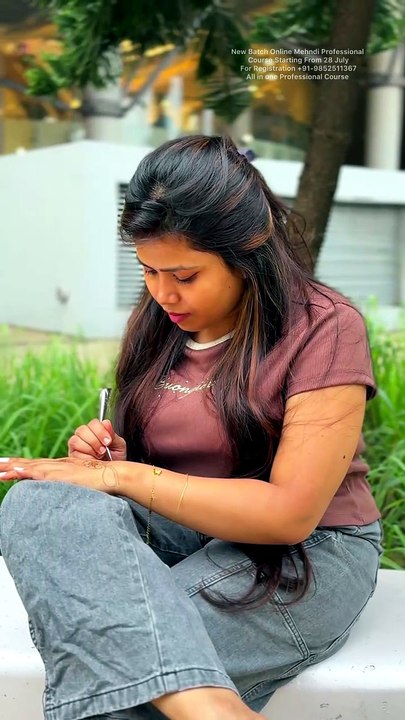 Try this beautiful back hand mehndi design