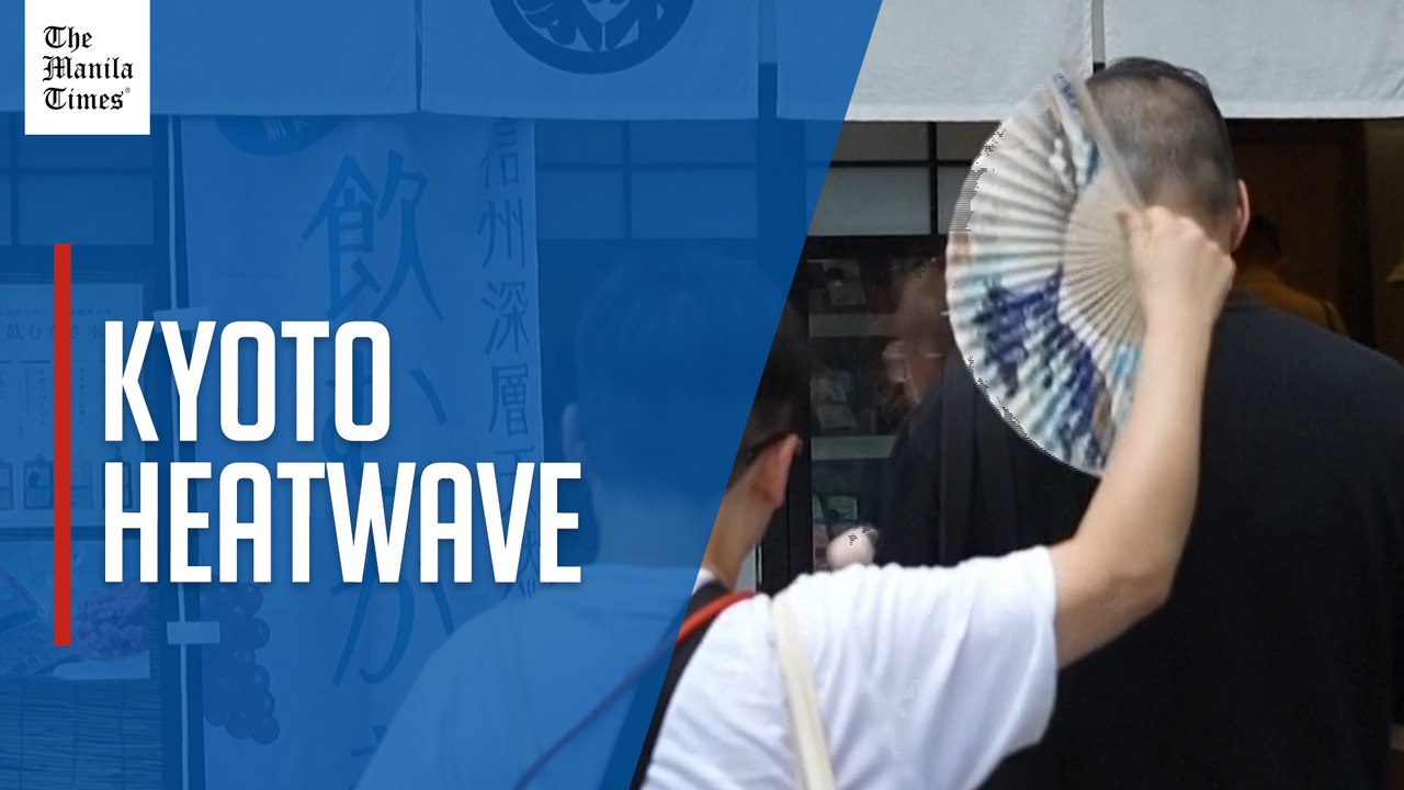 Tourists battle sweltering temperatures in Kyoto as heatwave grips west Japan