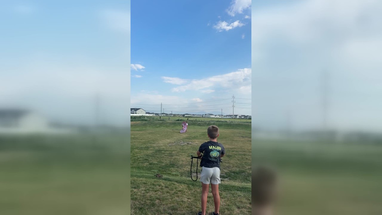 Powerful Kite Drags Kid Across Field