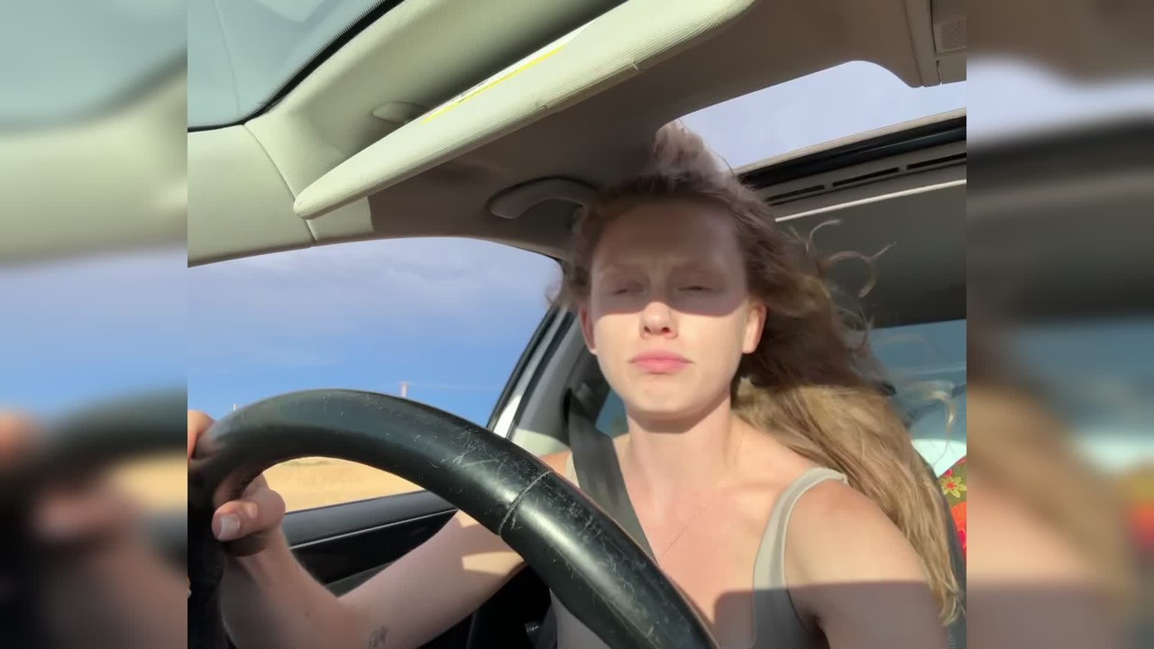 Woman's Hair Gets Sucked Into Sunroof Mid-road Trip