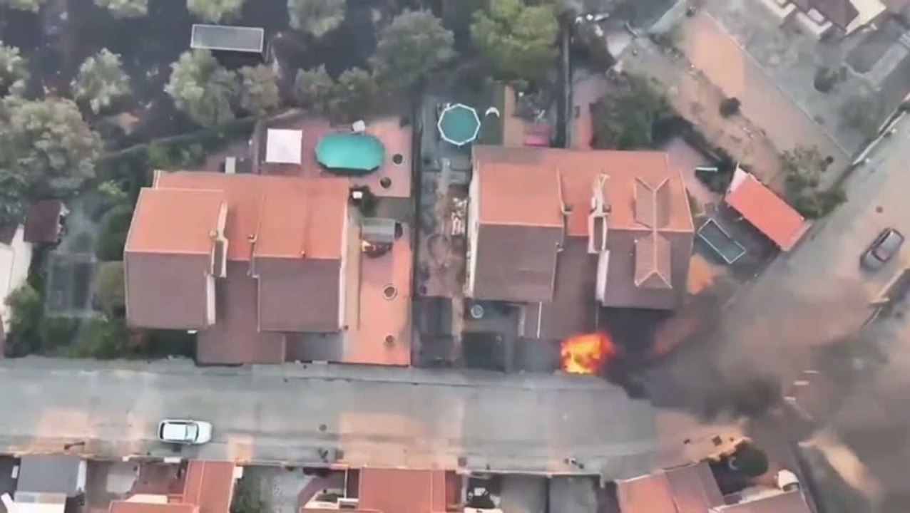Homes go up in flames as wildfires tear through Spain