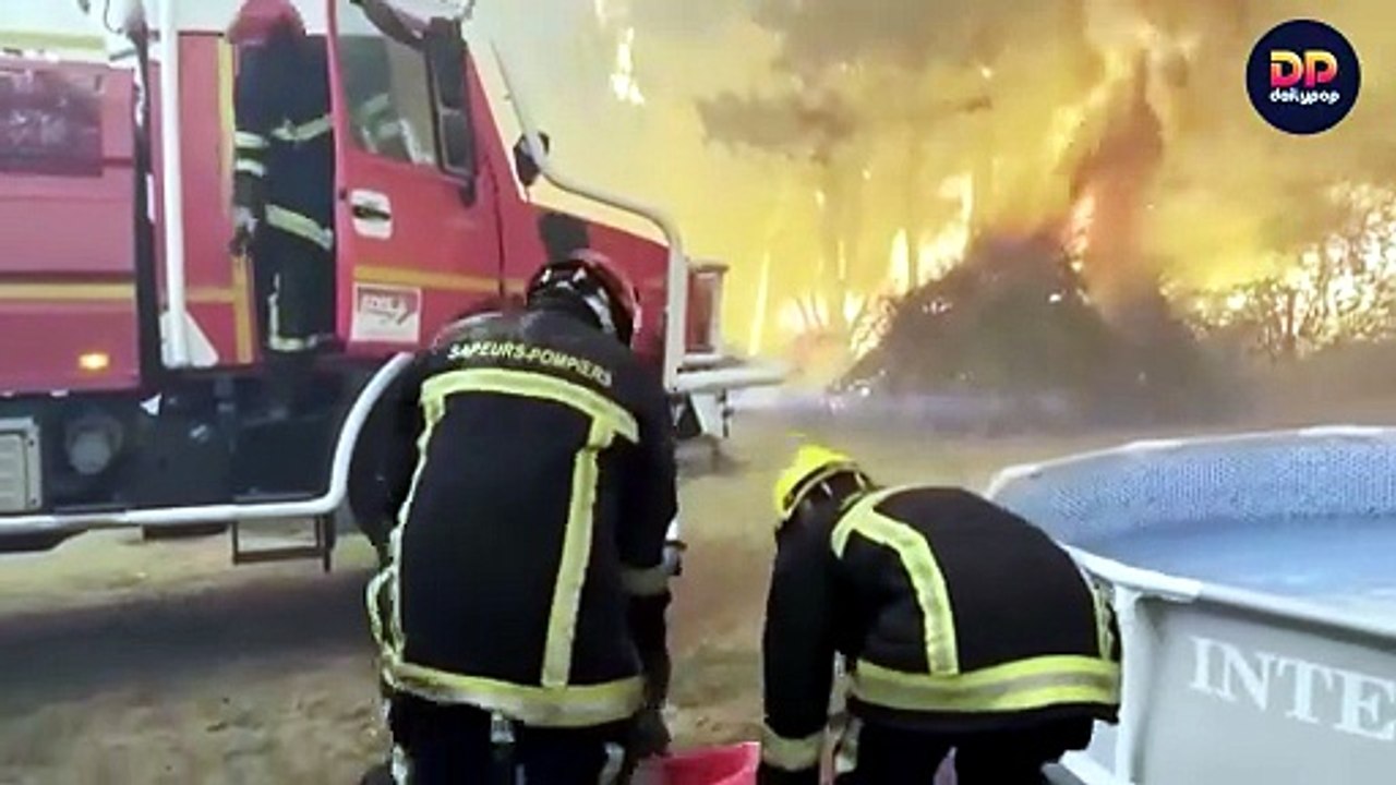 Bomberos franceses combaten incendios forestales durante la noche mientras se evacúan suburbios de Burdeos
