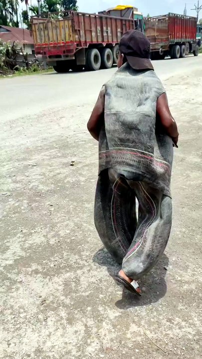Ray Bhai, who ordered the tire tube dress online, laughed.