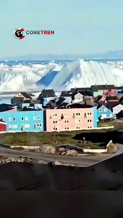 A giant iceberg flipped near Ilulissat, Greenland. The rare event