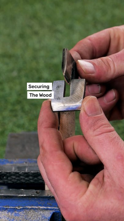 Securing a hardwood handle using metal cross