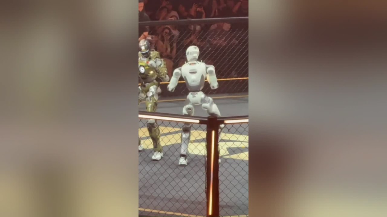 Dancing Robot Taunts Opponent Before Futuristic Fight Begins