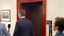 Deputy Premier Ben Carroll enters the Labor caucus room