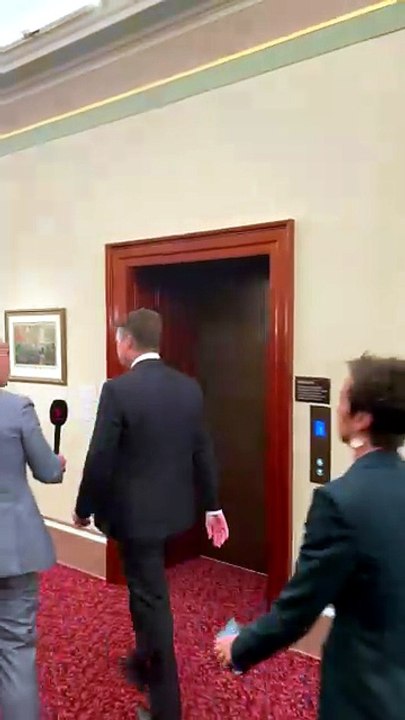 Deputy Premier Ben Carroll enters the Labor caucus room