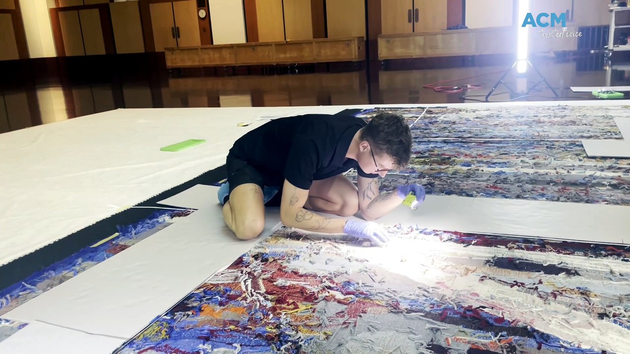 Massive artwork at Parliament House gets its regular clean - and this just one of its four panels