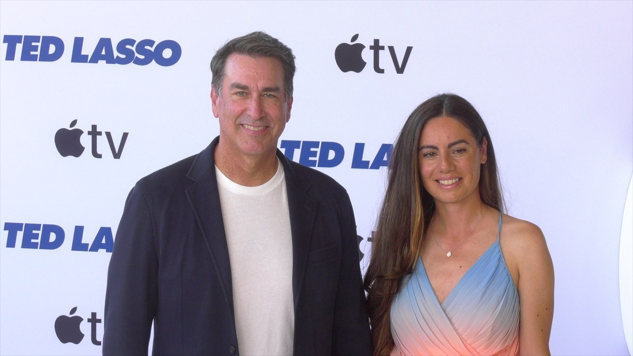 Rob Riggle and Kasia Kay attend the Season 4 premiere of "Ted Lasso" in Los Angeles