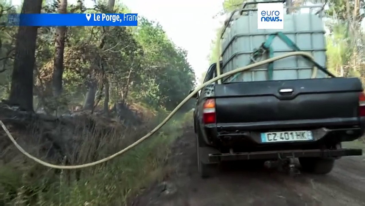 France wildfire: Residents douse embers with water after blaze destroys 170 homes in Le Porge