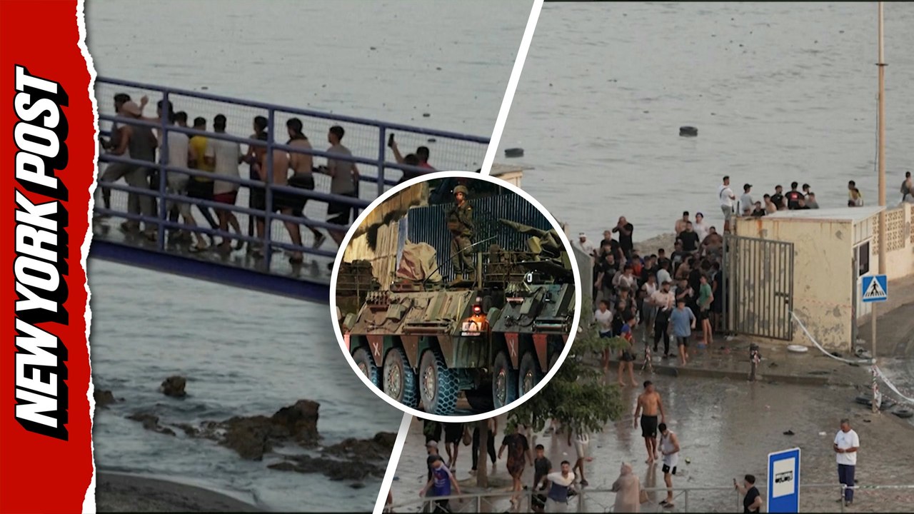 Hundreds of Migrants Pour Into Ceuta As Spain Deploys Border Forces